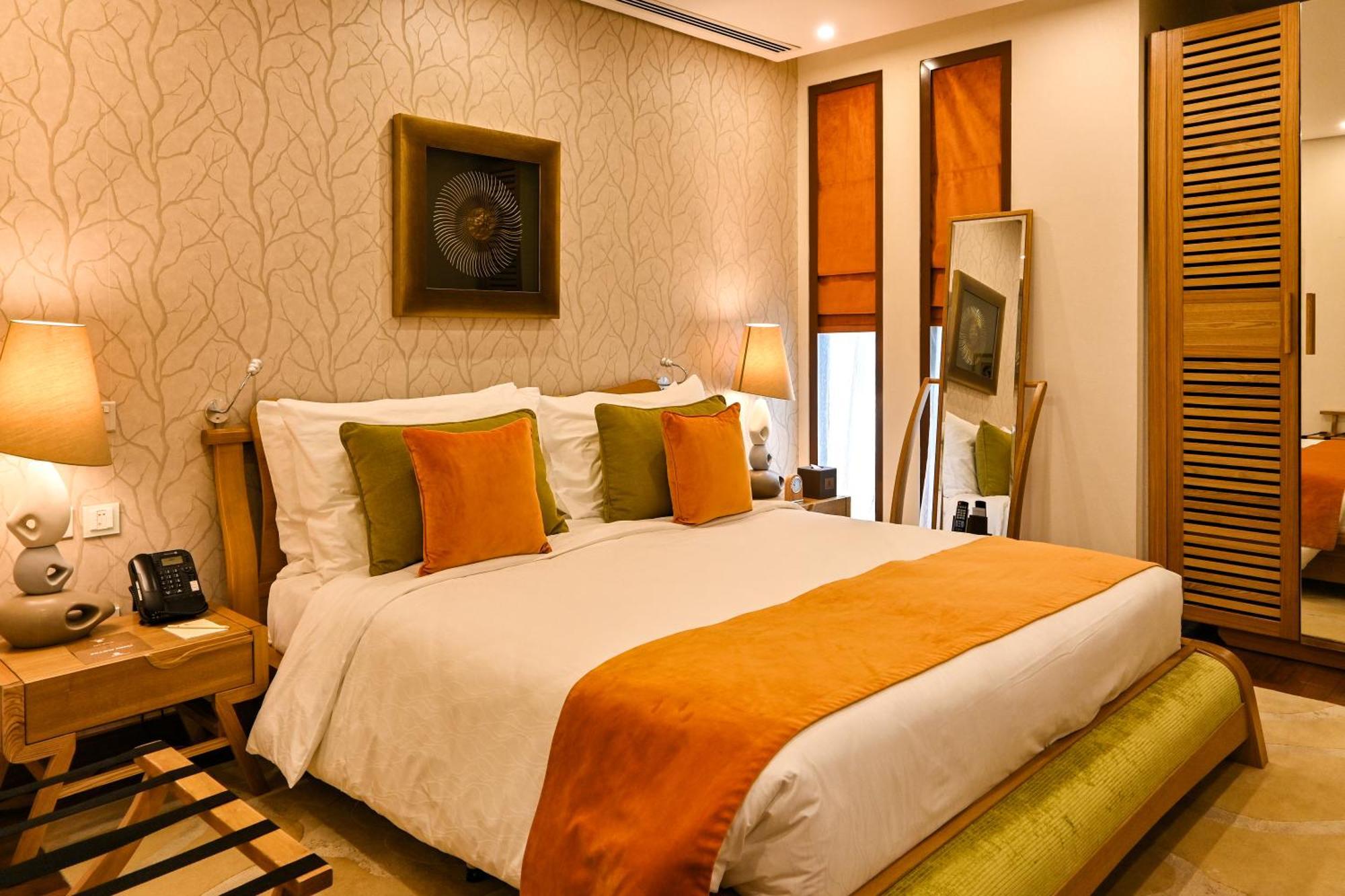 Palavra Resort Manama Ngoại thất bức ảnh A bedroom at the Taj Bengal