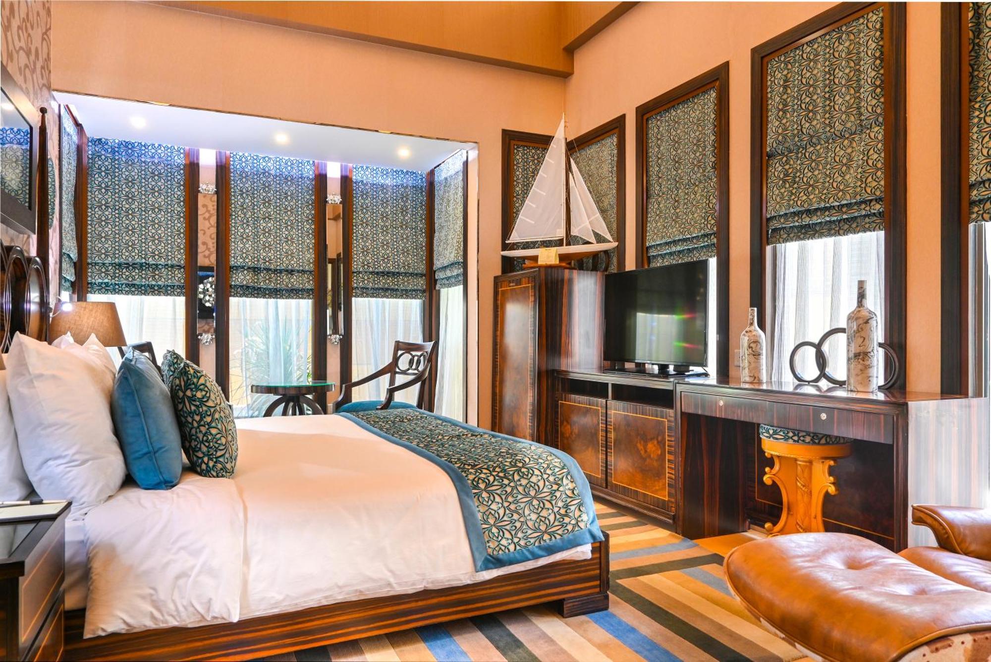 Palavra Resort Manama Ngoại thất bức ảnh A bedroom at the resort