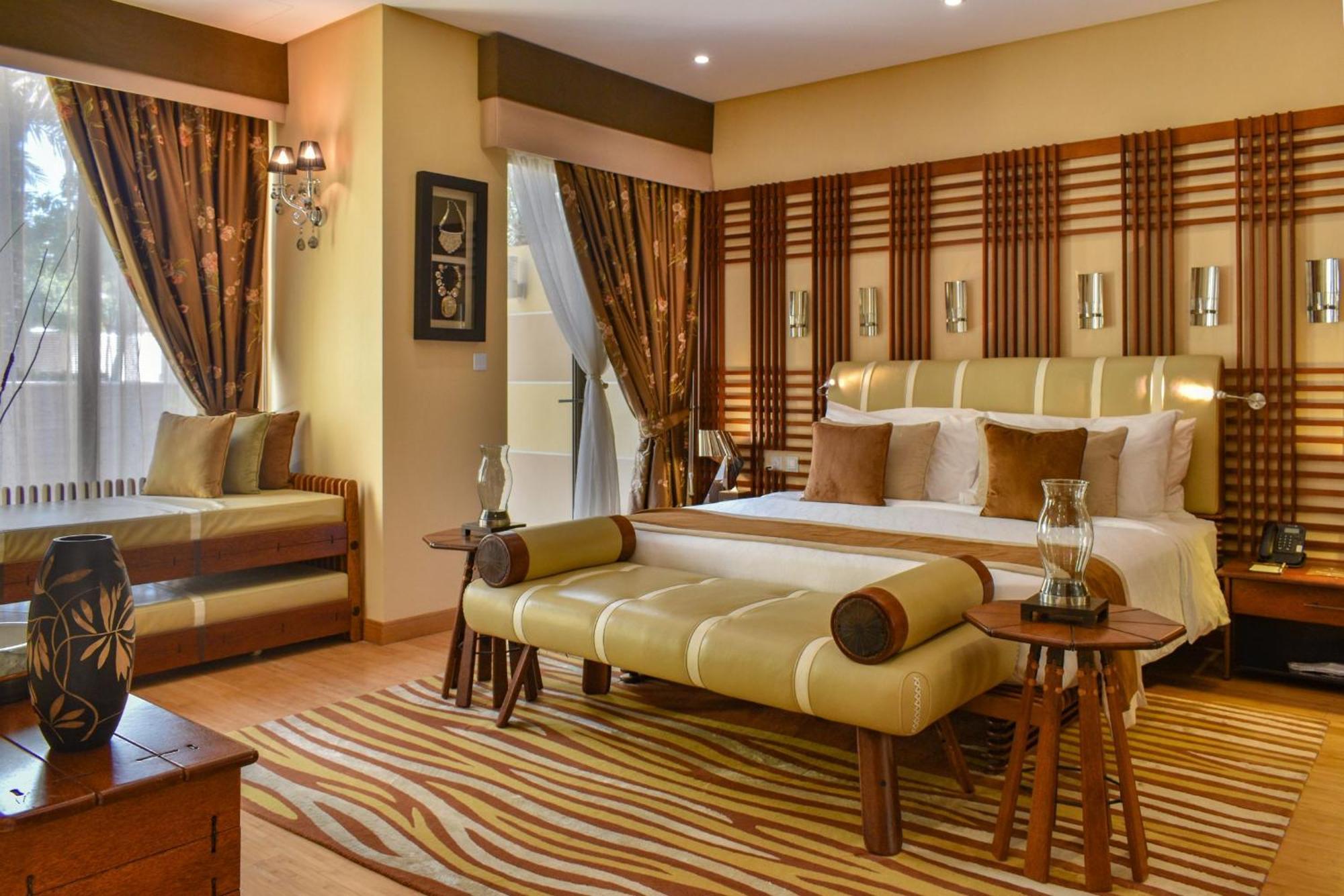 Palavra Resort Manama Ngoại thất bức ảnh A bedroom at the Taj Bengal