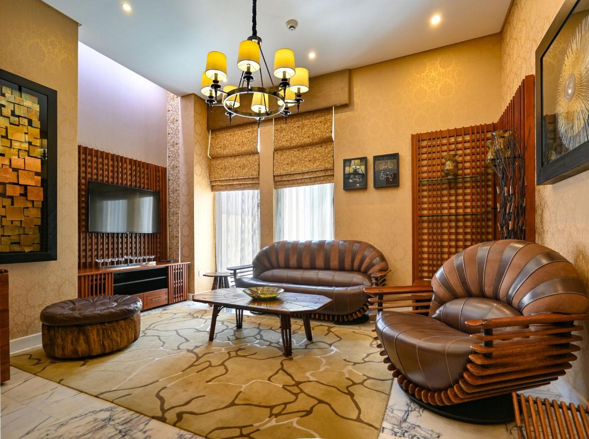 Palavra Resort Manama Ngoại thất bức ảnh A living room in a house