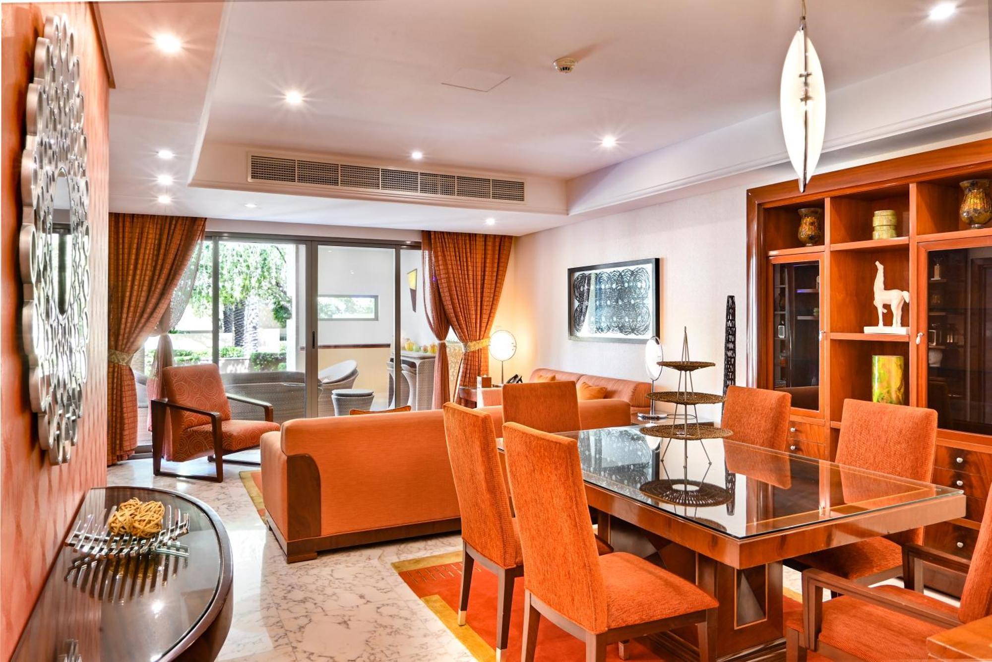 Palavra Resort Manama Ngoại thất bức ảnh A living room in a suite at the hotel