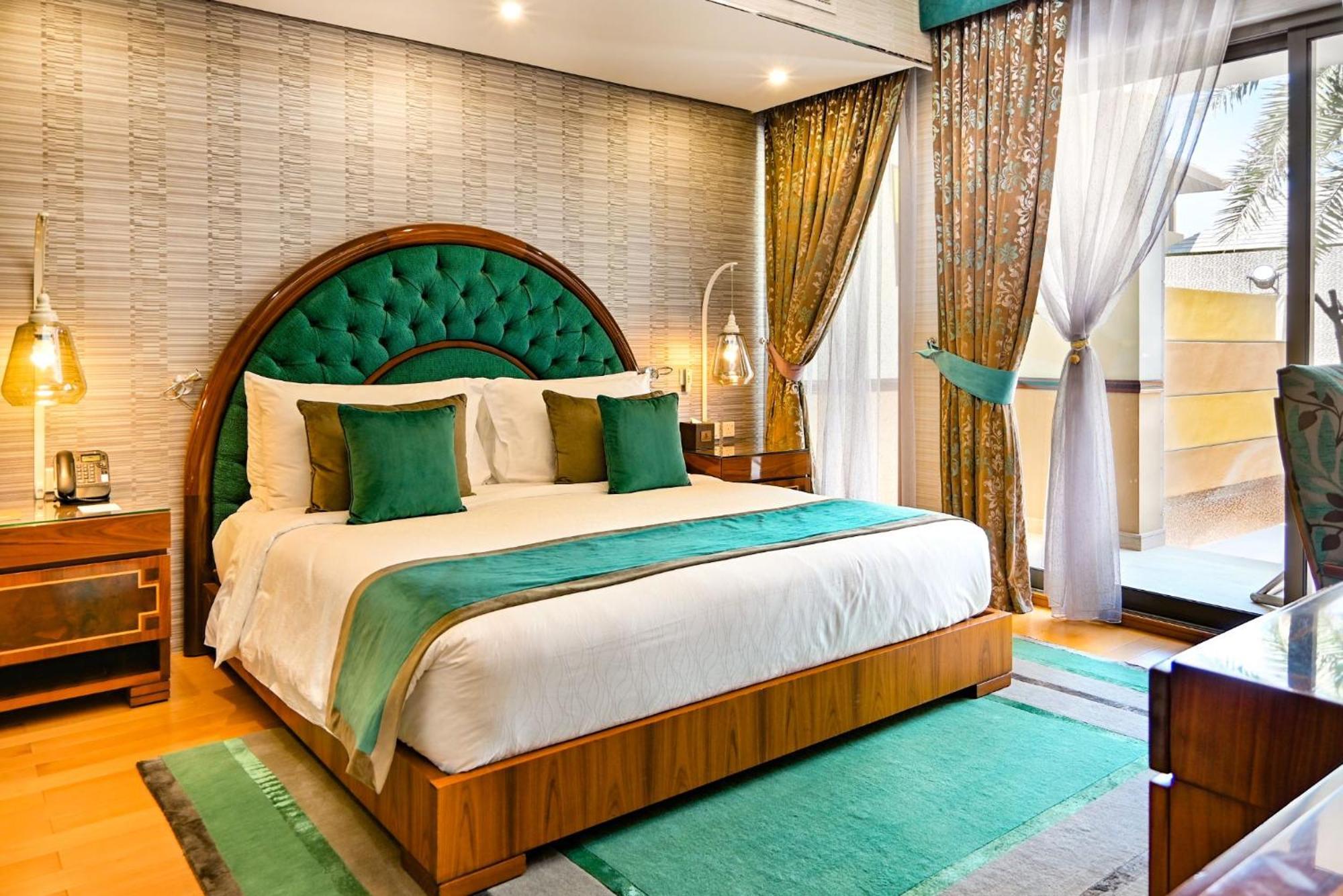 Palavra Resort Manama Ngoại thất bức ảnh A bedroom at the hotel